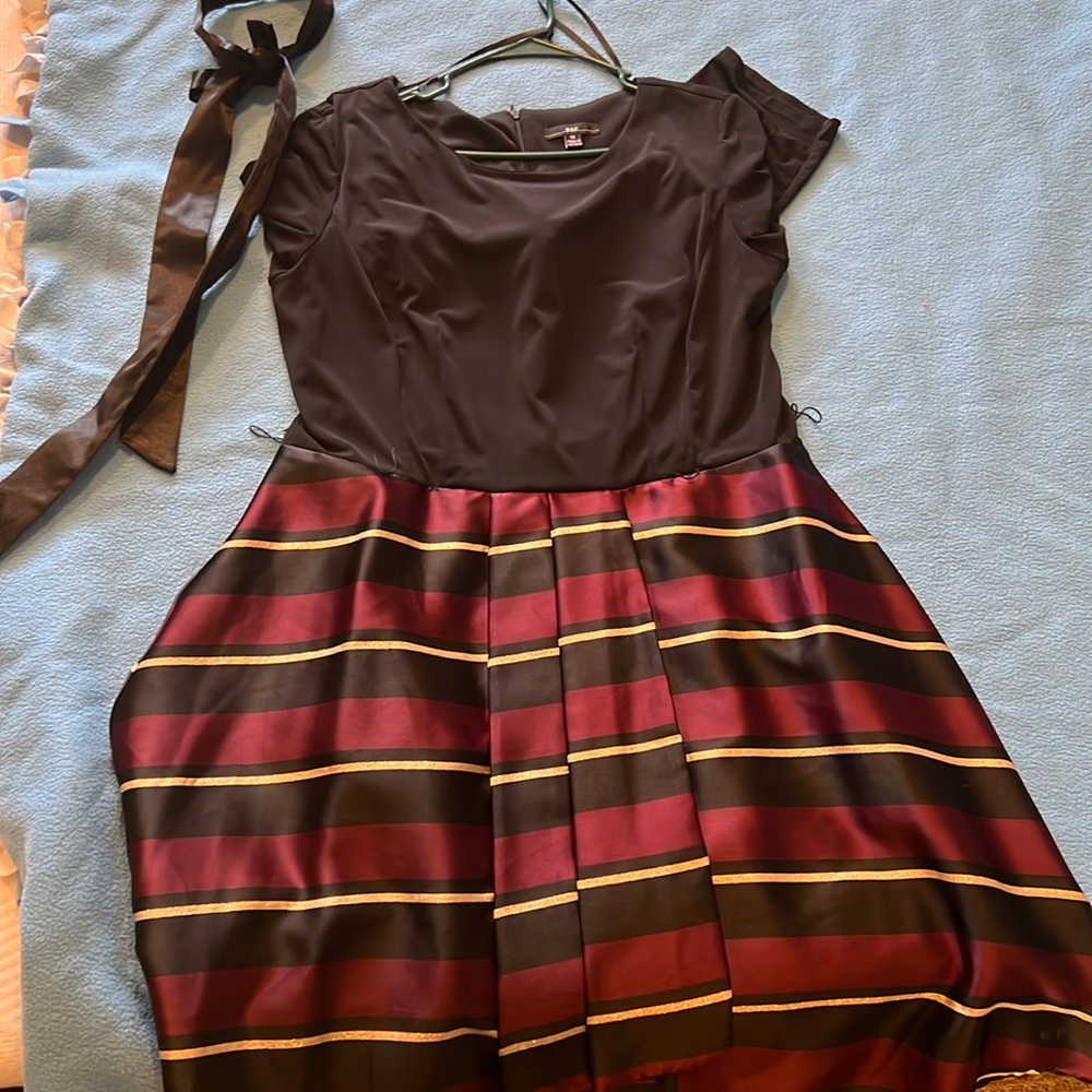 Once worn beautiful high low gold burgundy and black long sleeve